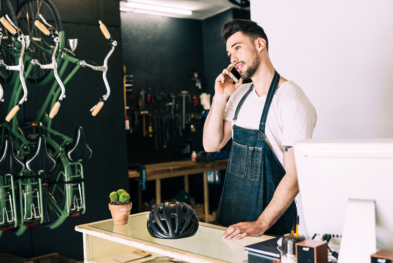 bike-shop-with-shop-assistant 1 Threat Alliance | Enterprise-Grade Cybersecurity Services for Growing Small Businesses